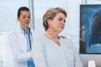 Female doctor examining a patient