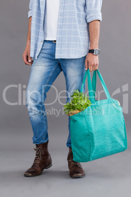 Man carrying grocery bag