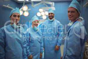 Portrait of surgeons standing in operation theater