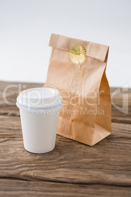 Disposable coffee cup and parcel bag