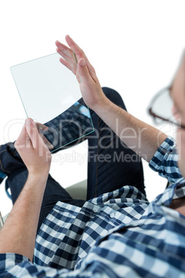 Man pretending to be using futuristic digital tablet