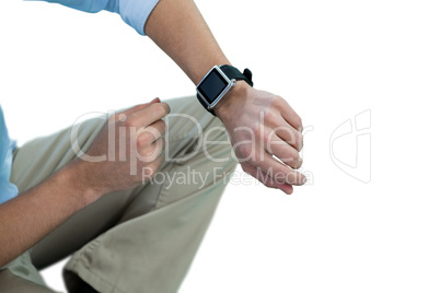 Man using smart watch against white background