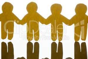 Paper cut outs holding hands together on white background