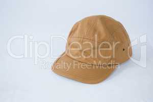 Brown cap on white background