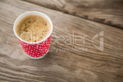 Close-up of coffee in disposable cup