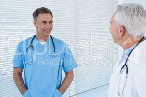 Surgeon and doctor interacting with each other