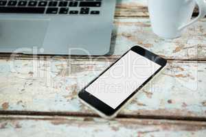 Smartphone on wooden table