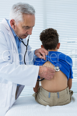 Doctor examining a patient