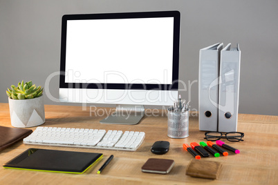 Desktop pc with office stationery