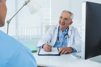 Doctor interacting with surgeon