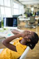 Frustrated female business executive at desk