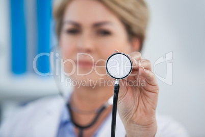 Portrait of doctor holding stethoscope