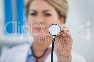 Portrait of doctor holding stethoscope
