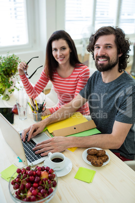 Graphic designers working at desk