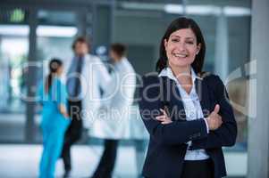 Businesswoman with hands folded