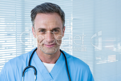 Portrait of smiling surgeon