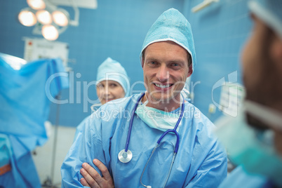 Portrait of male surgeon smiling in operation theater