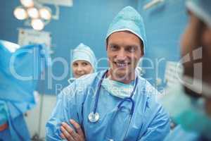 Portrait of male surgeon smiling in operation theater