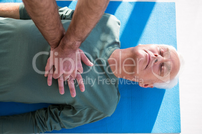 Paramedic performing resuscitation on patient