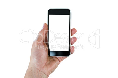 Close-up of hand holding mobile phone