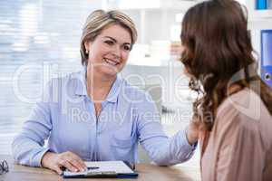 Doctor interacting with patient