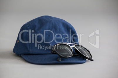 Blue cap with sunglasses