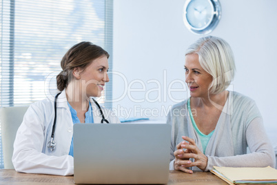 Doctor interacting with patient