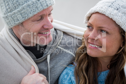 Couple interacting with each other on beach