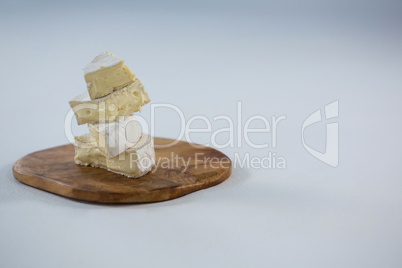Brie cheese on wooden board