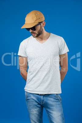 Man in cap and sunglasses