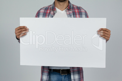 Man holding blank placard Man holding blank placard