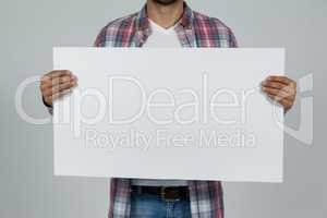 Man holding blank placard