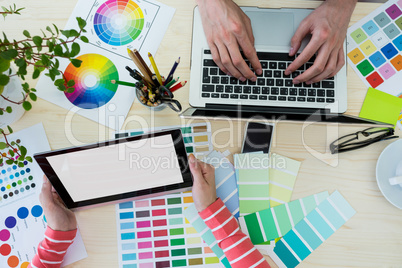 Graphic designer working at his desk