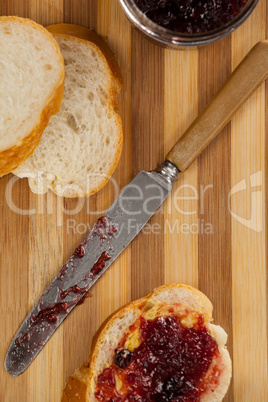 Bread with jam and knife