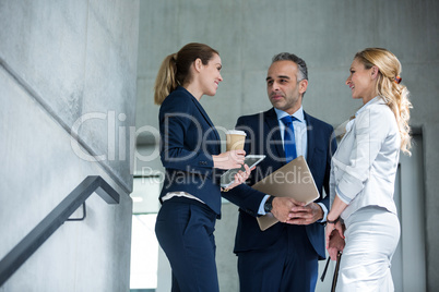 Business colleagues interacting with each other