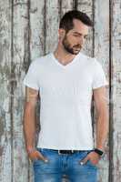 Handsome man in white t-shirt and blue jeans