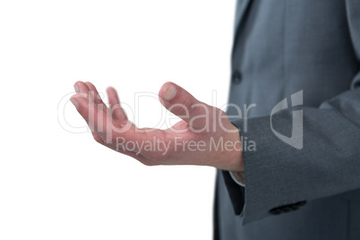 Mid section of businessman pretending to be holding