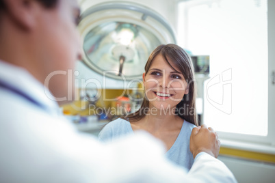 Female patient interacting with doctor during visit