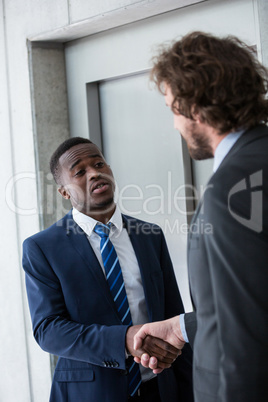 Businessmen shaking hands with each other