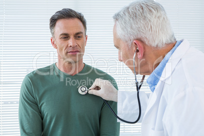 Doctor examining a patient