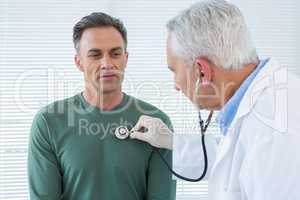 Doctor examining a patient