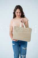Woman holding shopping bag