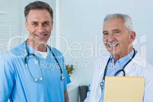 Portrait of smiling surgeon and doctor