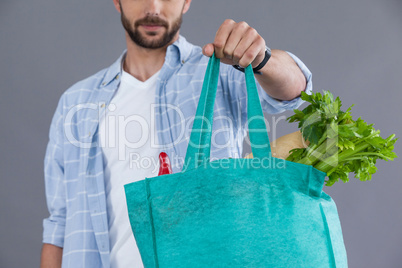 Man holding a grocery bag