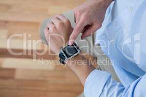 Man using his smart watch