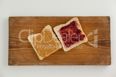 Bread slices with jam and peanut butter