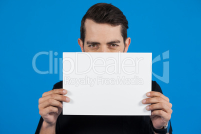 Man holding a blank placard