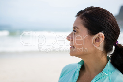 Close-up of thoughtful woman on beach