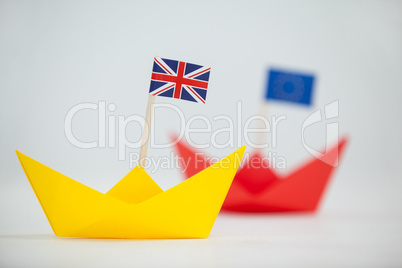 Yellow paper boat with union jack flag
