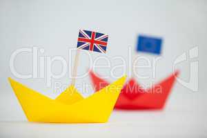 Yellow paper boat with union jack flag